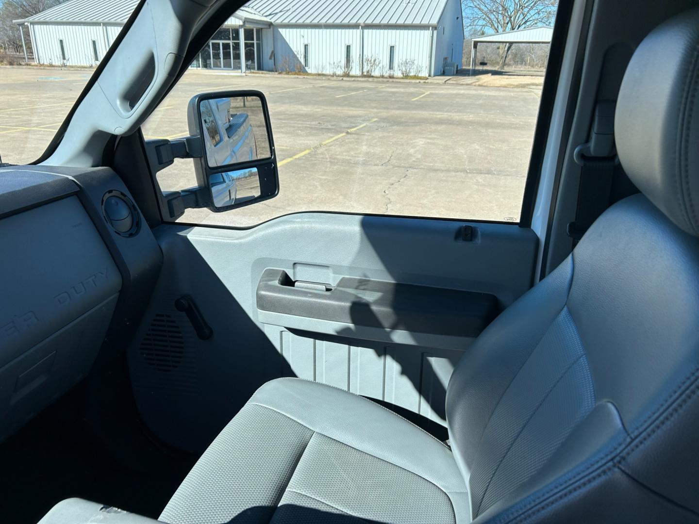 2015 White /Gray Ford F-250 SD (1FT7X2A62FE) with an 6.2L V8 OHV 16V engine, 6-Speed Automatic transmission, located at 17760 Hwy 62, Morris, OK, 74445, (918) 733-4887, 35.609104, -95.877060 - 2015 FORD F250 HAS THE 6.2 V8 ENGINE. THIS TRUCK IS BI-FUEL (RUNS ON BOTH CNG OR GASOLINE) FEATURES MANUAL SEATS, MANUAL LOCKS, MANUAL WINDOWS, MANUAL MIRRORS, AM/FM RADIO, CRUISE CONTROL, TRACTION CONTROL, BACK UP CAMERA. EQUIPPED WITH A WESTPORT BI-FUEL CNG FUEL SYSTEM. IT RUNS ON CNG (COMPRESSED - Photo#9